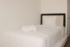 Comfy and Tidy Studio at Riverview Jababeka Apartment By Travelio
